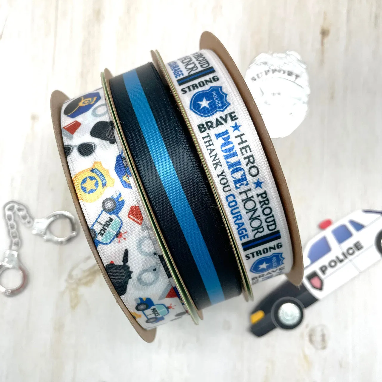 Police Car ribbon with hats, cars sunglasses, and handcuffs  printed on 5/8" white satin